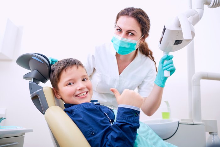 Ребенок на приеме стоматолога